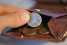 Geldbeutel - Foto: Andreas Gebert/dpa