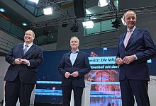 Braun, Röttgen und Merz - Foto: Michael Kappeler/dpa