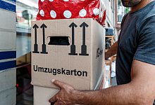 Mit gebrauchten Kartons umziehen - Markus Scholz/dpa-tmn