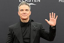 Robbie Williams - Felix Hörhager/dpa