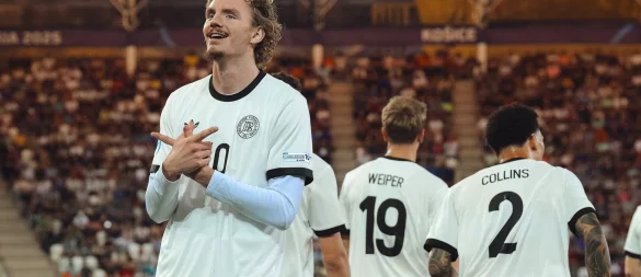 Nick Woltemade jubelt auch im Halbfinale als Torschütze. - © Robert Nemeti/dpa