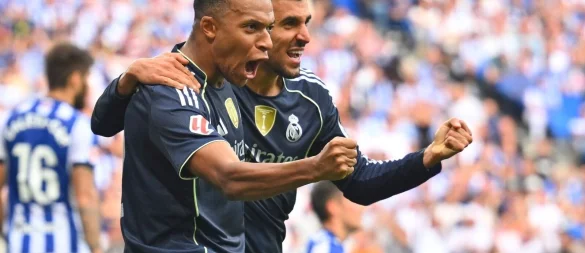 Stürmerstar Kylian Mbappé (l) war der Garant für den vierten Saisonsieg von Real Madrid. - © Miguel Oses/AP/dpa