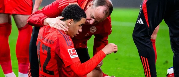 Jamal Musiala bei seiner Verletzung in Augsburg. - © Tom Weller/dpa