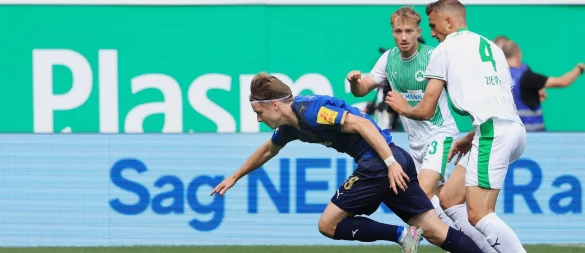 Nach einem starken Konter erzielte Jonas Therkelsen (links) die Führung für Kiel. - © Karl-Josef Hildenbrand/dpa