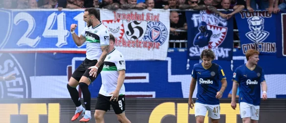 Hannovers Virgil Ghita (l) feiert seinen Ausgleichstreffer. - © Gregor Fischer/dpa