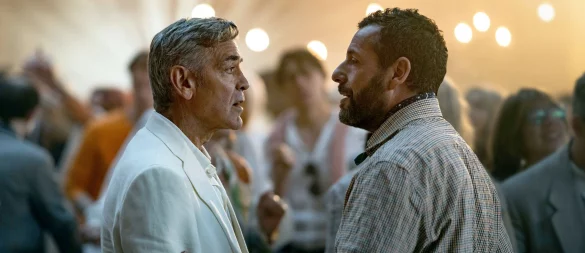 George Clooney spielt den alternden Filmstar Jay Kelly, Adam Sandler seinen leidgeplagten Manager Ron Sukenick. - © Peter Mountain/Netflix/dpa