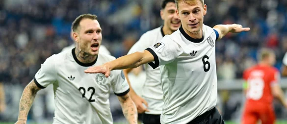 Der Kapitän ging voran: Joshua Kimmich (r) traf im 104. Länderspiel erstmals doppelt. Links David Raum, Torschütze zum 1:0. - © Uwe Anspach/dpa