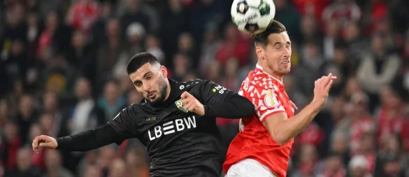 Schenkten sich nichts: Deniz Undav und Dominik Kohr im Luftduell. - © Torsten Silz/dpa