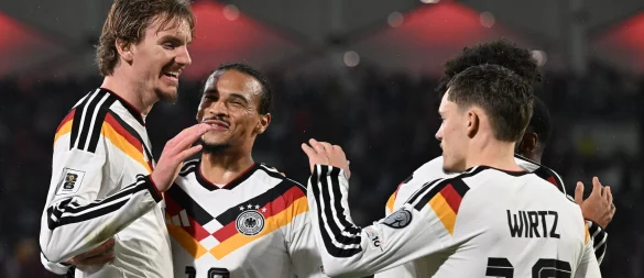 Vorbereiter Sané und Torjäger Woltemade können nach dem mühsamen Sieg in Luxemburg jubeln. - © Federico Gambarini/dpa