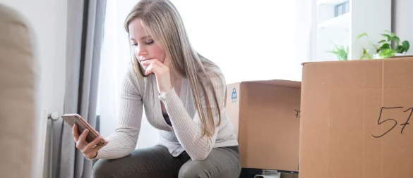 Zwischen gepackten Kartons und neuen Möglichkeiten: Wer für den Beruf umzieht, sollte alle Aspekte sorgfältig abwägen. - © Christin Klose/dpa-tmn