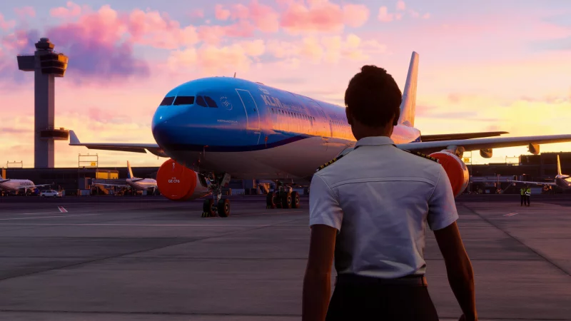Ein Pilot blickt auf ein Flugzeug bei Sonnenuntergang – der „Microsoft Flight Simulator 2024“ hebt im Dezember 2025 auf der PS5 ab. - © Asobo Studio