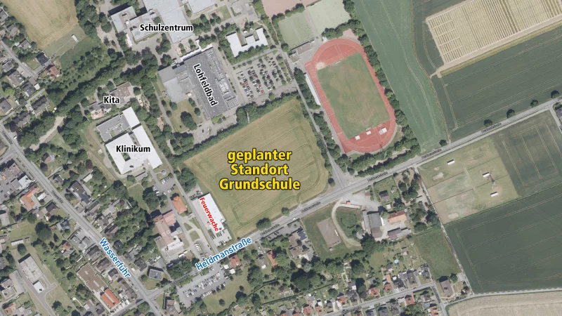 Auf dem noch freien Areal an der Heldmanstraße soll die neue Schule gebaut werden. - © Tim-online/Geobasisdaten NRW