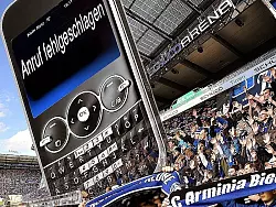 Die Mobilfunknetze werden w&auml;hrend Bundesligapartien stark belastet. Deswegen ist der Empfang oft schlecht &ndash; und bricht manchmal ganz zusammen. - &copy; MONTAGE: ANDREAS FR&Uuml;CHT