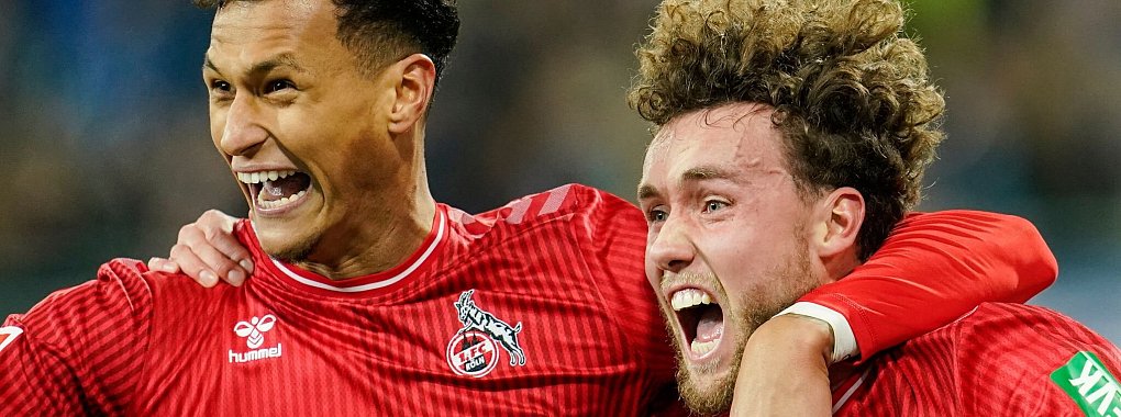 Der Kölner Davie Selke (l) trainiert wieder. - © Uwe Anspach/dpa