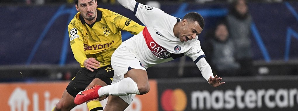 Der BVB um Mats Hummels (l) trifft auf Kylian Mbapp&eacute; und Co. - &copy; Bernd Thissen/dpa