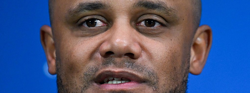 Vincent Kompany bei der Pressekonferenz in Mailand. - © Sven Hoppe/dpa