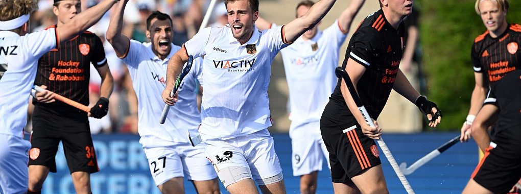 Justus Weigand (M) von den MHC-Herren spielt auch in der Nationalmannschaft. - © Federico Gambarini/dpa