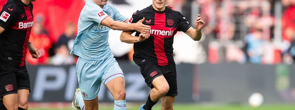 Im DFB-Pokal wird es zwischen Leverkusen und Köln ein hitziges Duell. - © Marius Becker/dpa