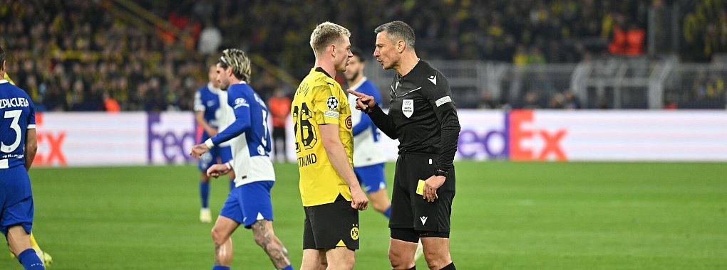 Schiedsrichter Slavko Vincic (r) hatte bereits das Viertelfinal-R&uuml;ckspiel zwischen dem BVB und Atl&eacute;tico gepfiffen. - &copy; Bernd Thissen/dpa