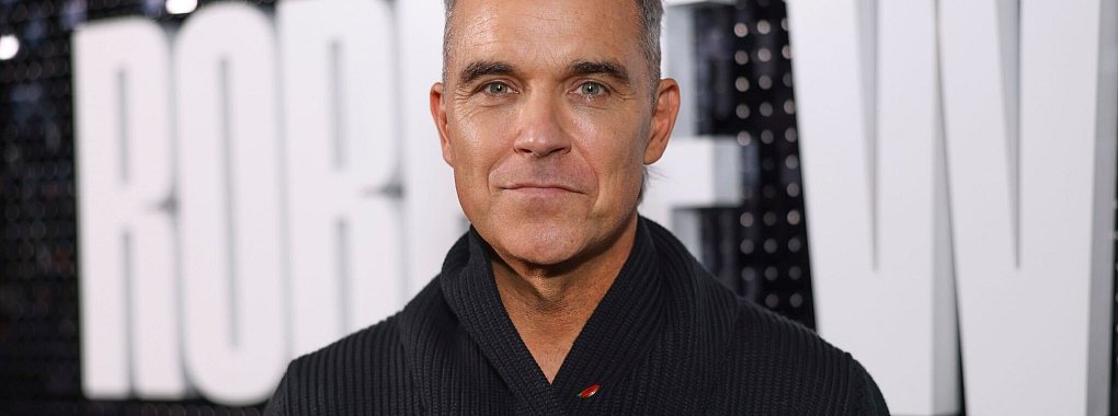 Es gibt Spekulationen, dass Robbie Williams seinen Lieblingsclub Port Vale übernehmen könnte. - © Vianney Le Caer/Invision/AP/dpa