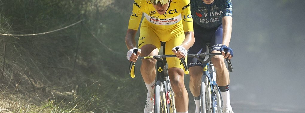 Tadej Pogacar (l) und Jonas Vingegaard sind die großen Favoriten auf den Tour-Sieg. - © Pool Jan De Meuleneir/Belga/dpa