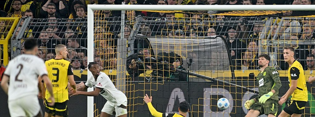 Abseits oder nicht? Das Tor von St. Paulis Morgan Guilavogui in Dortmund zählte nicht. - © Bernd Thissen/dpa