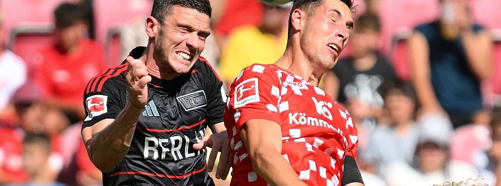 Robin Gosens (l) wird für den 1. FC Union Berlin so schnell kein Kopfballduell mehr bestreiten. - © Torsten Silz/dpa