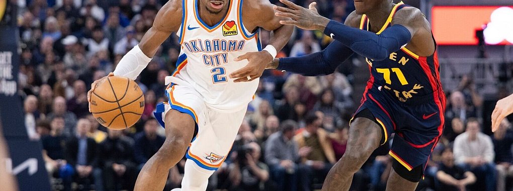 Auch Dennis Schröder konnte Shai Gilgeous-Alexander nicht stoppen, die Warriors gewannen dennoch. - © Benjamin Fanjoy/AP/dpa