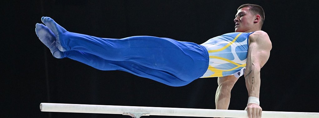 Illja Kowtun aus der Ukraine turnt am Barren. - &copy; Marijan Murat/dpa