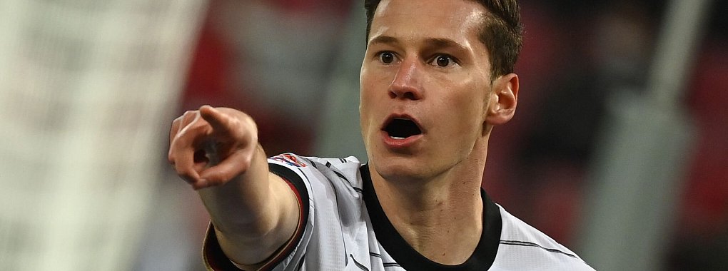 Julian Draxler hat seinen Vertrag beim katarischen Club Al-Ahli SC verlängert. - © Federico Gambarini/dpa