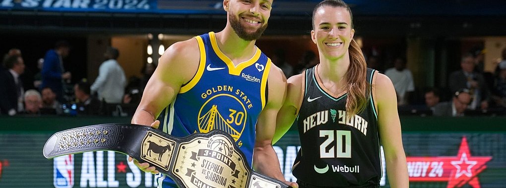 Stephen Curry von Golden State Warriors und Sabrina Ionescu von den New York Liberty posieren f&uuml;r Fotos. - &copy; Darron Cummings/AP