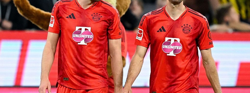 Harry Kane (l) und Thomas Müller - glückt die Wende in Mailand? - © Sven Hoppe/dpa