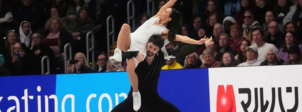 Das Eistanz-Duo Jennifer Janse van Rensburg und Benjamin Steffan holte einen Quotenplatz für Olympia. - © Charles Krupa/AP/dpa