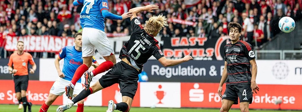 Berlins Tom Rothe (3. v. l.) leitete das 1:0 der Berliner in Kiel ein. - © Axel Heimken/dpa