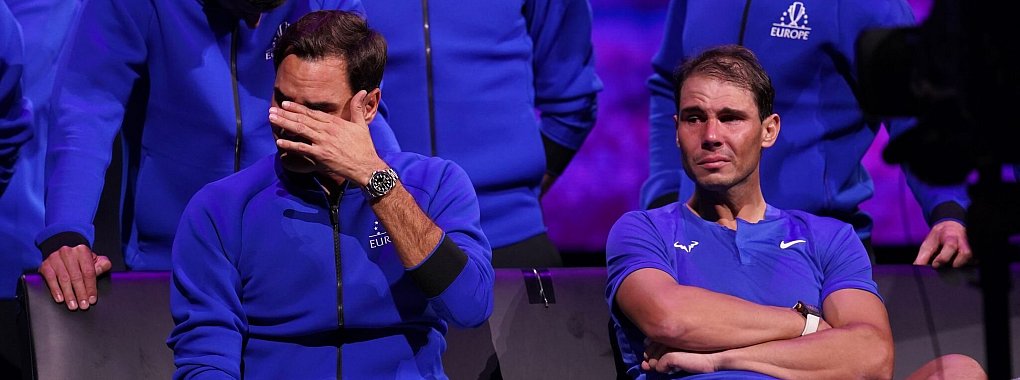 Tränen zum Abschied: Roger Federer (l) und Rafael Nadal. - © John Walton/Press Association/dpa