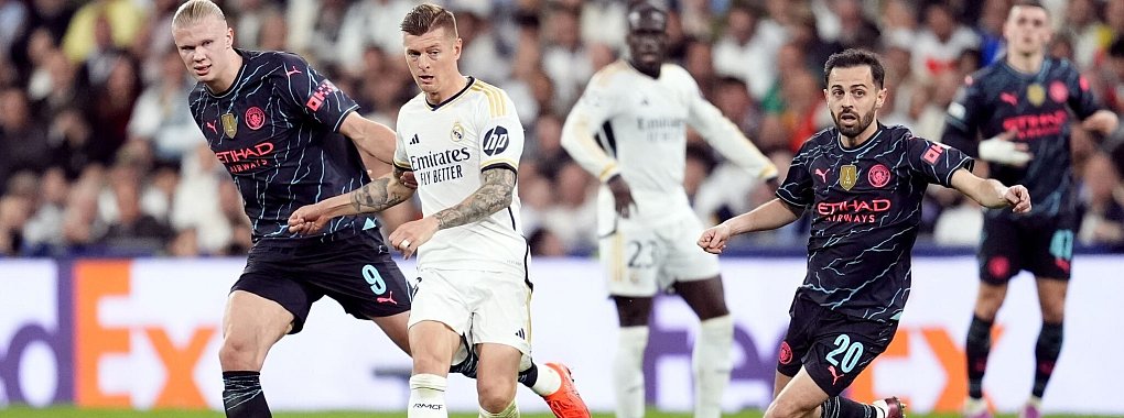 Toni Kroos (M) und Real Madrid trennten sich von Manchester City mit 3:3. - &copy; Nick Potts/PA Wire/dpa