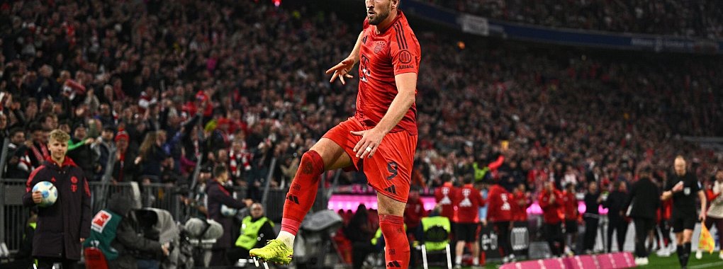 Harry Kane feiert seine Tore. - © Tom Weller/dpa