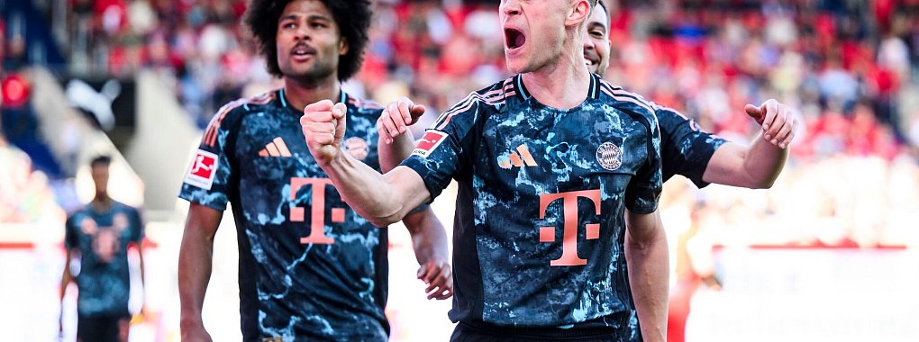 Erzielte in Heidenheim das 4:0 für die Bayern: Joshua Kimmich (r.). - © Tom Weller/dpa