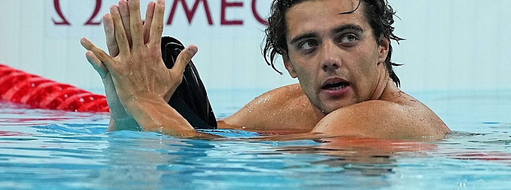 Thomas Ceccon hat mit einem Nickerchen in einem Park für Aufsehen gesorgt. - © Michael Kappeler/dpa