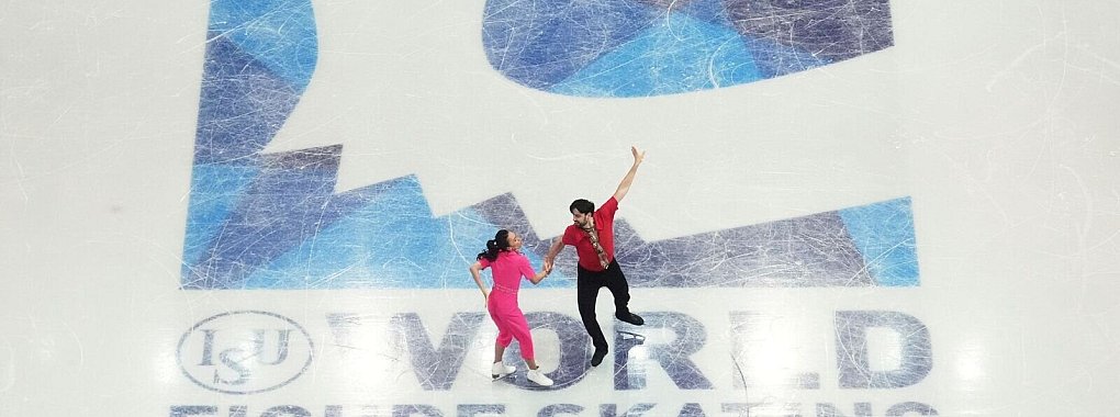 Jennifer Janse van Rensburg (l) und Benjamin Steffan liegen nach dem Rhythmustanz auf dem zwölften Platz. - © Charles Krupa/AP/dpa