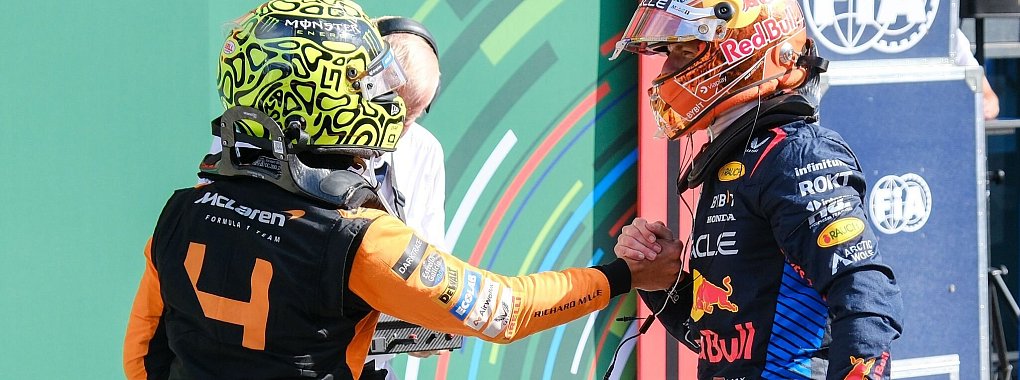 Lando Norris (l) verweist Max Verstappen auf Platz zwei. - © Patrick Post/AP/dpa