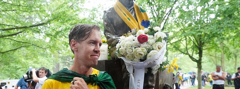 Zwei Formel-1-Legenden: Sebastian Vettel und Ayrton Senna. - © David Davies/PA Wire/dpa