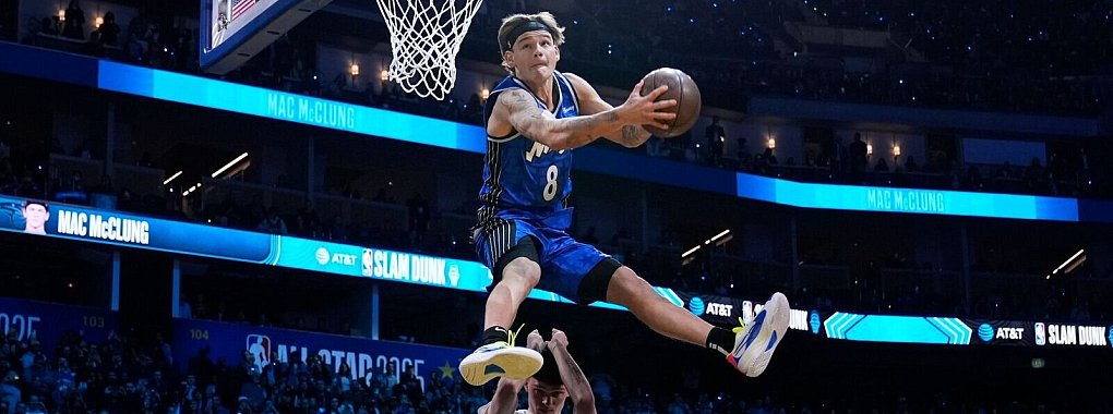 Mac McClung springt beim Slam-Dunk-Wettbewerb über Mensch und Auto. - © Godofredo A. Vásquez/AP/dpa