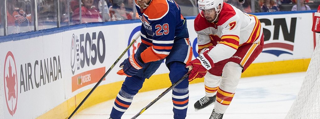 Leon Draisaitl (l.) bereitete zum 53. Mal in dieser Saison einen Treffer der Oilers vor. - © Jason Franson/The Canadian Press via AP/dpa