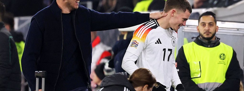Bundestrainer Julian Nagelsmann und Florian Wirtz. - © Christian Charisius/dpa
