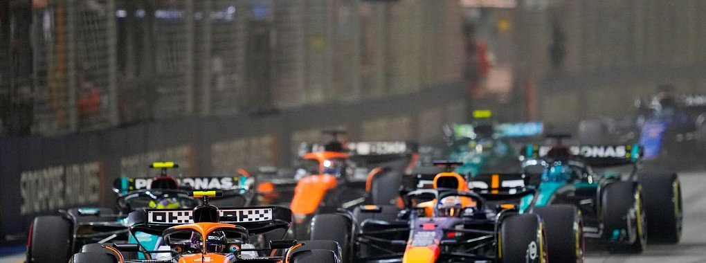 Lando Norris erwischt endlich mal einen guten Start von der Pole. - © Vincent Thian/AP/dpa