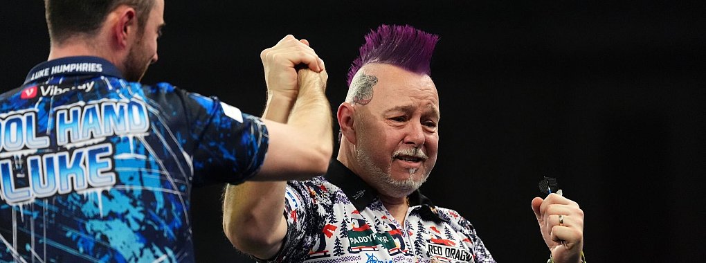 Weint nach der riesigen Überraschung: Peter Wright. - © Zac Goodwin/PA Wire/dpa
