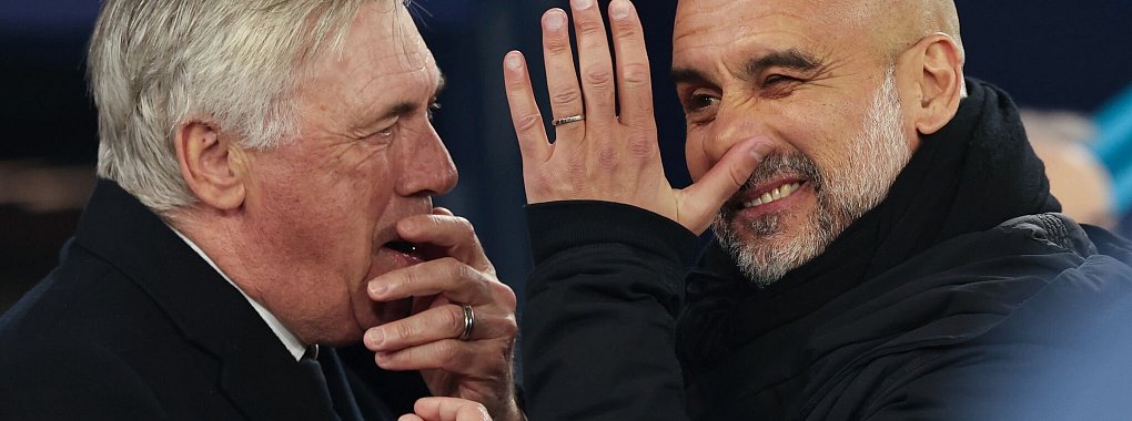 Nur einer wird nach dem nächsten Duell von Carlo Ancelotti (l) und Pep Guardiola noch lachen. - © Darren Staples/AP/dpa