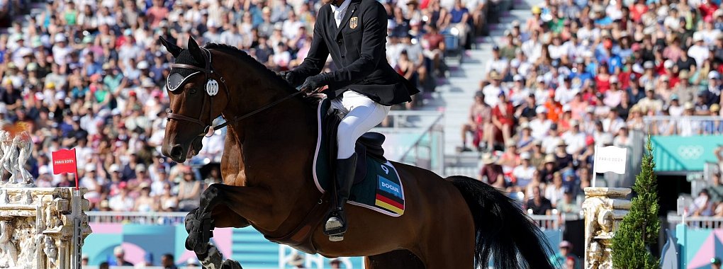 Marvin Dogue bei seinem Ritt im olympischen Finale. - &copy; Rolf Vennenbernd/dpa