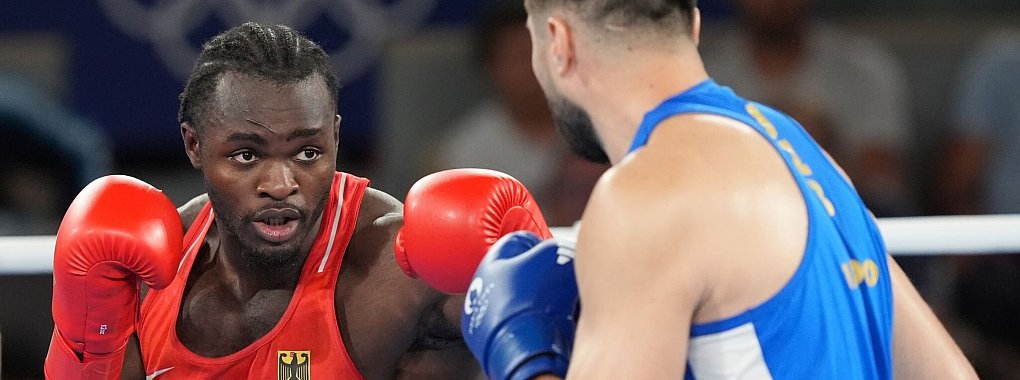 Der Deutsche Nelvie Tiafack (l.) gewann bei Olympia in Paris Bronze. - © Marcus Brandt/dpa